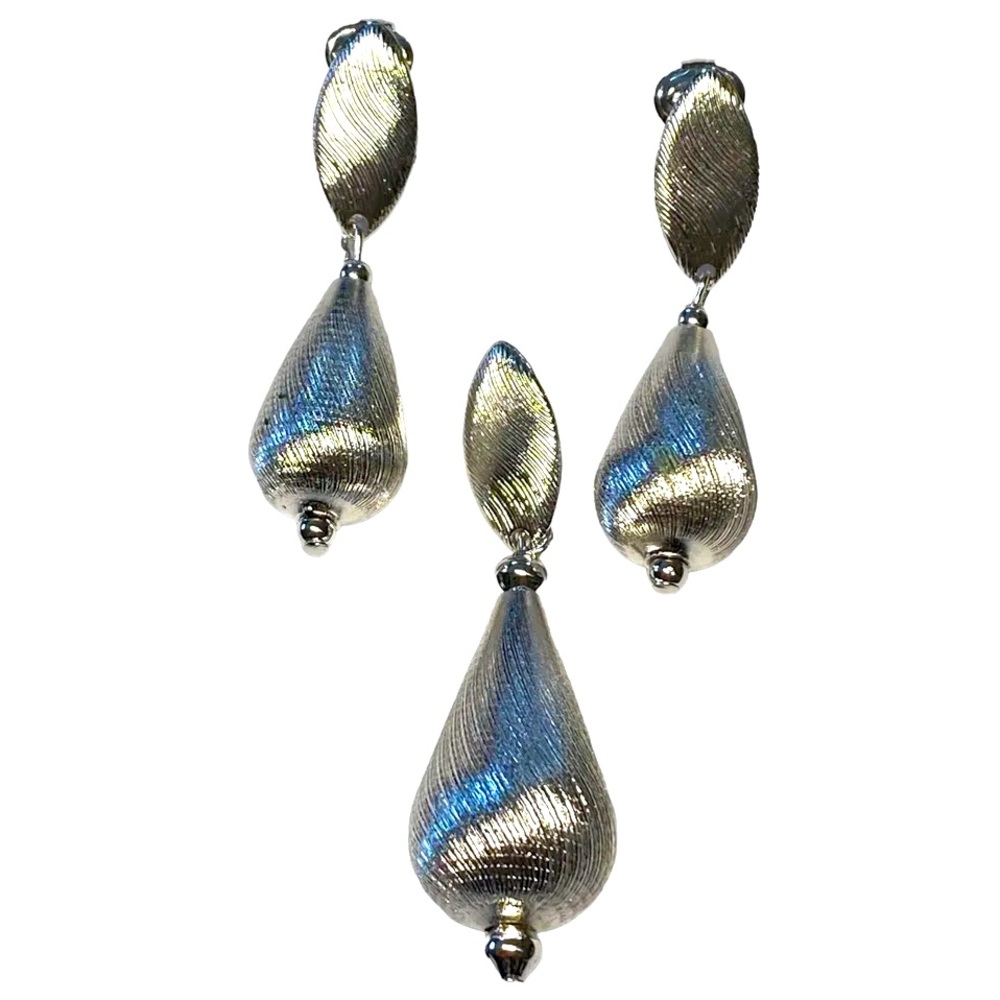 Vintage 1970s Silver Goddess signed Sara Coventry Pendant and Clip earring set